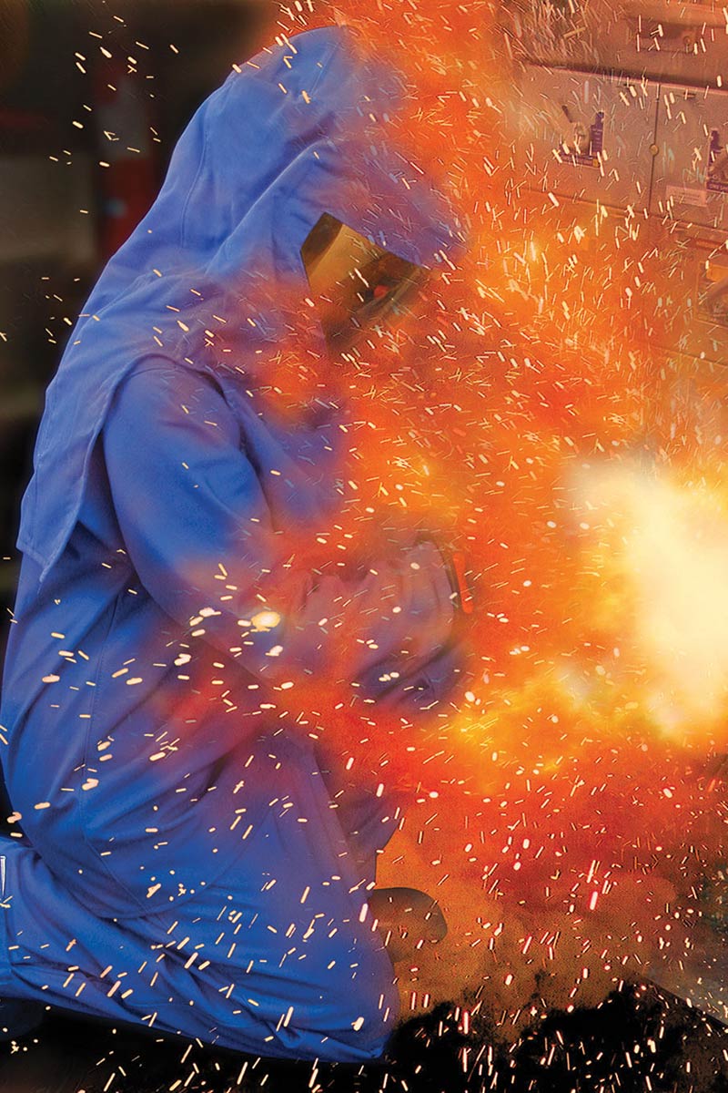 An arc flash explosion in front of worker